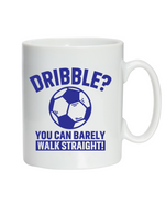 A white ceramic mug with a funny football slogan on the front that reads 'Dribble You Can Barely Walk Straight!'