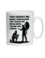 A white mug with the funny rugby saying on the front that reads 'You Taught Me More Than Rugby, You Taught Me Resilience. Thank You, Coach'