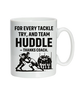 A white mug with the funny rugby saying on the front that reads 'For Every Tackle, Try and Team Huddle – Thanks Coach'