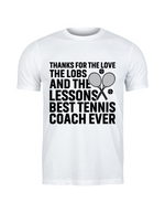 A white t-shirt with the funny tennis coach saying on the front that reads 'Thanks for the Love the Lobs and the Lessons. Best Tennis Coach Ever'