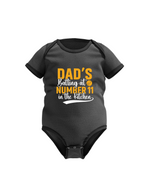 Dad’s Batting at Number 11 in the Kitchen. Funny Cricket Baby Bodysuit, Organic or In-Conversion to Organic Cotton, Self Fabric Bound Neckline, Cuffs and Leg Openings