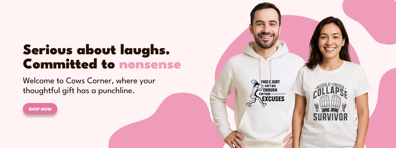 Two people wearing humorous t-shirts with text, standing against a pink background with a heart design.