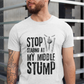 A man wearing a white t-shirt with Stop Staring At My Middle Stump on the front. A Funny Cricket T-Shirt, Premium Fabric, Multiple Adult Sizes