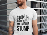 A man wearing a white t-shirt with Stop Staring At My Middle Stump on the front. A Funny Cricket T-Shirt, Premium Fabric, Multiple Adult Sizes