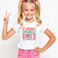 A little girl wearing a white t-shirt with If Cricket Is Life, Then Dad's The Groundskeeper on the front. A Funny Cricket T-Shirt, Premium Fabric, Multiple Junior Sizes