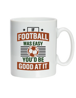 A white ceramic mug with a funny football slogan on the front that reads 'If Football Was Easy You’d Be Good at It'