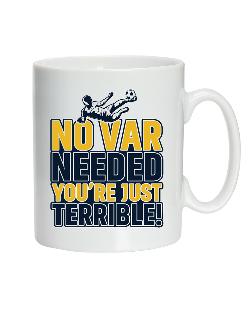 A white ceramic mug with the funny football slogan on the front that reads 'No VAR Needed You’re Just Terrible'