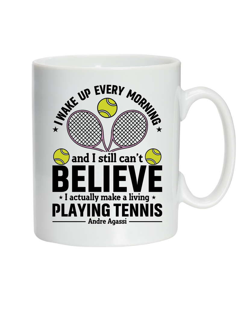 A white ceramic mug with tennis slogan on the front that reads 'I Wake Up Every Morning and Still Can’t Believe I Actually Make a Living Playing Tennis.'