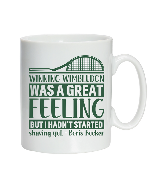 A white coffee cup with a tennis slogan on the front saying 'Winning Wimbledon Was a Great Feeling, but I Hadn’t Started Shaving Yet – Boris Becker'