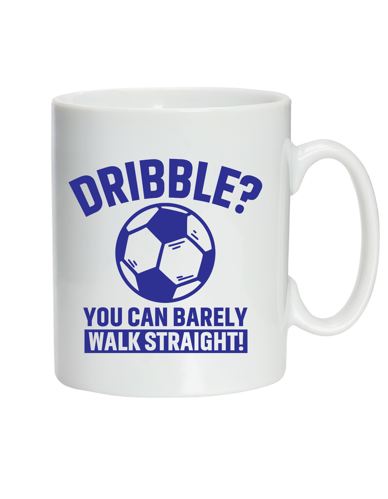 A white ceramic mug with a funny football slogan on the front that reads 'Dribble You Can Barely Walk Straight!'