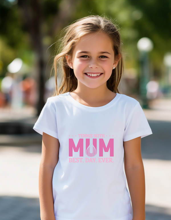 A girl wearing a white t-shirt with the lovely tennis saying on the front that reads 'Tennis with Mums. Best. Day. Ever!'