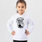 Child wearing a white hoodie with a graphic and text on a light gray background