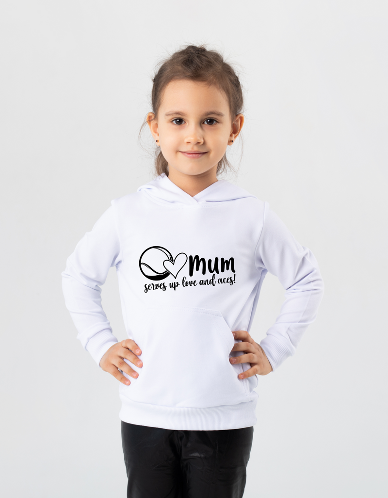 A girl wearing a white hoodie with the lovely tennis slogan on the front that reads 'Mum Serves Up Love and Aces'