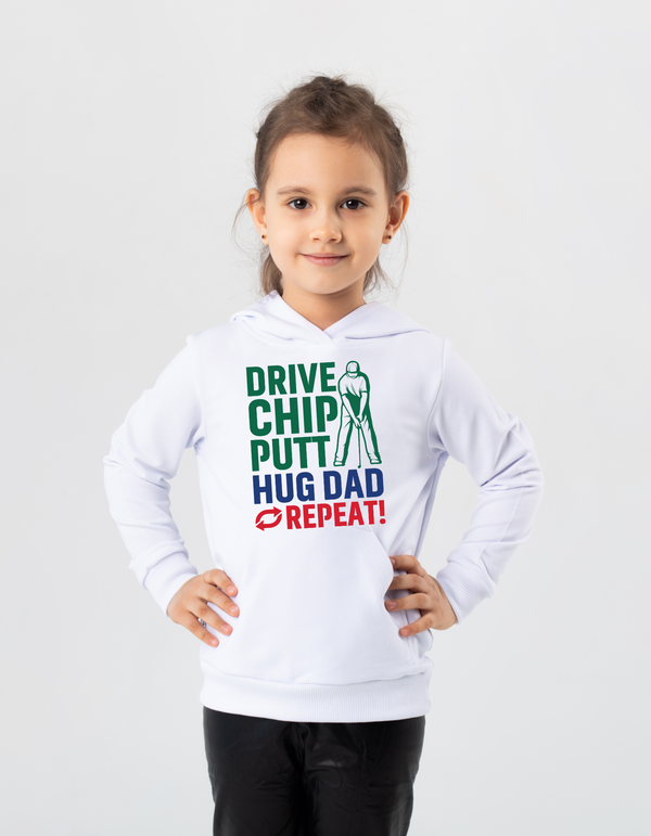 Child wearing a white hoodie with text design on a light gray background with a Cows Corner slogan saying Drive, Chip, Putt, Hug Dad, Repeat.