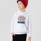 Child wearing a white hoodie with text, standing against a plain background, with a slogan on the front saying 'My Mum Tackles Everything on the Pitch and at Home!'