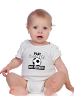 A baby wearing a white baby grow with the funny football slogan written on the front that reads 'Play Football Not Fortnite!