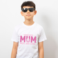 A boy wearing a white t-shirt with the lovely tennis saying on the front that reads 'Tennis with Mums. Best. Day. Ever!'