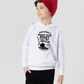 Child wearing a white hoodie with a graphic and text on a plain background