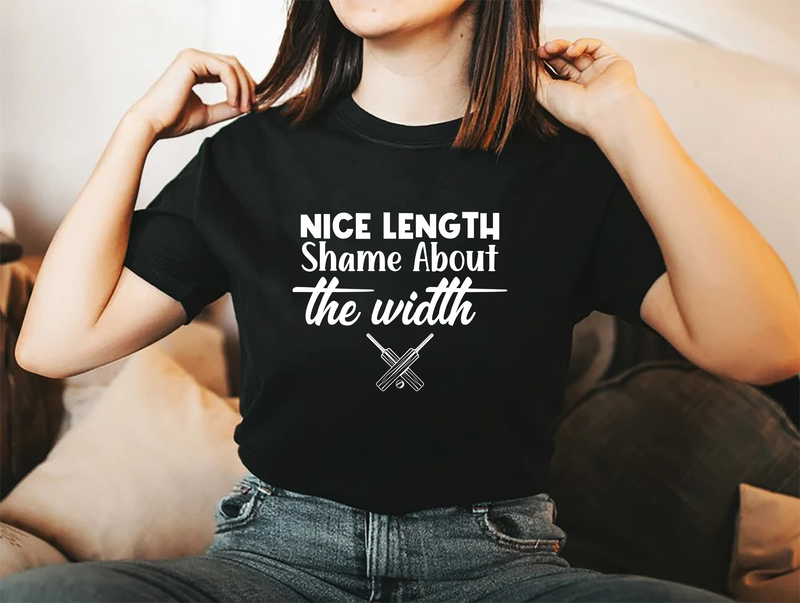 A lady wearing a black t-shirt with Nice Length Shame About The Width on the front. A Funny Cricket Tee, Premium Fabric, Multiple Adult Sizes
