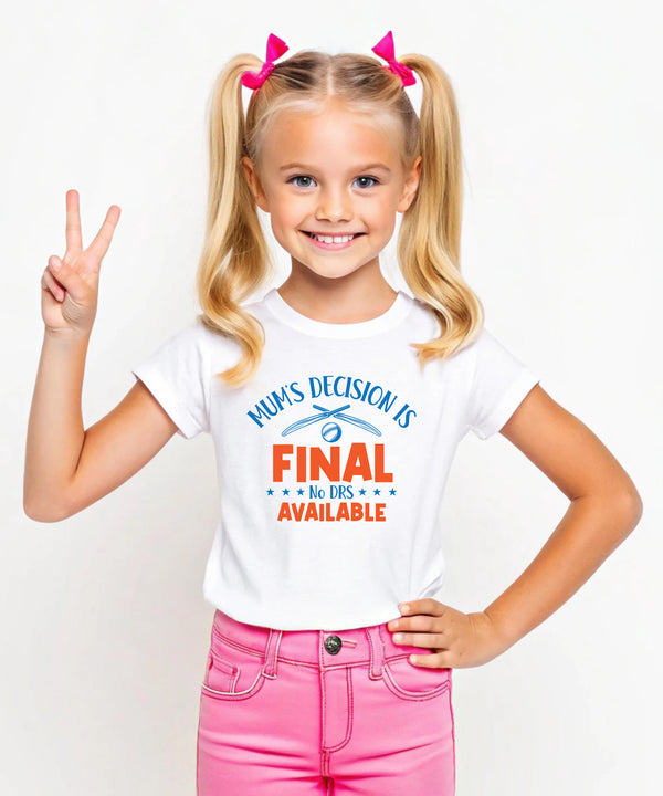 A little girl wearing a white t-shirt with Mum’s Decision Is Final – No Drs Available on the front. A Funny Kids’ Cricket T-Shirt, Premium Fabric, Multiple Junior Sizes, Perfect for Boys and Girls