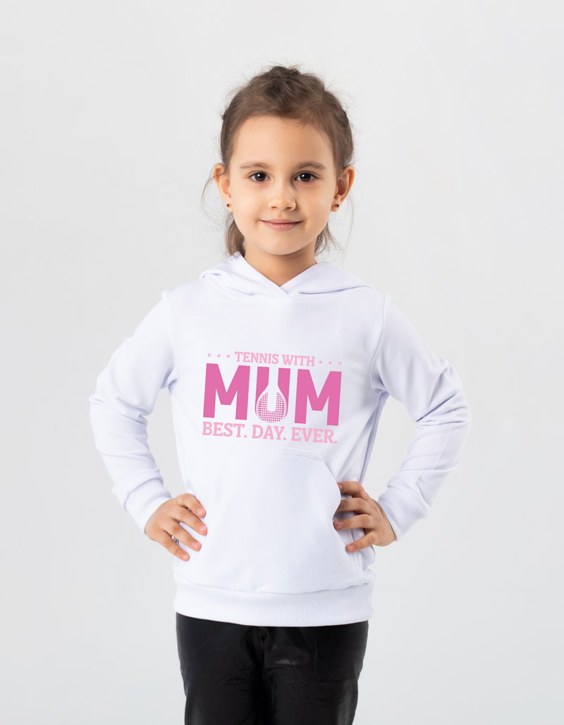 A girl wearing a white hoodie with a lovely tennis saying on the front that reads 'Tennis with Mums. Best. Day. Ever!'