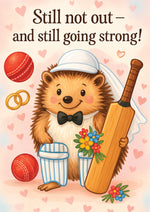 Card with a hedgehog holding a cricket bat and balls, surrounded by hearts and flowers, with text 'Still not out - and still going strong!'.