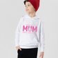 A boy wearing a white hoodie with a lovely tennis saying on the front that reads 'Tennis with Mums. Best. Day. Ever!'