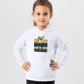 A little girl wearing a white t-shirt with the funny football slogan on the front that reads 'No VAR Needed You’re Just Terrible'