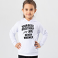 A girl wearing a white hoodie that has the funny football slogan on the front that reads 'Your Best Position? Bench Warmer'
