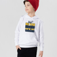 A little boy wearing a white t-shirt with the funny football slogan on the front that reads 'No VAR Needed You’re Just Terrible'