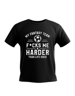 Black t-shirt with white text and a soccer ball graphic on a white background with a funny Cows Corner slogan on the front saying 'my fantasy team f*cks me hard than life does'