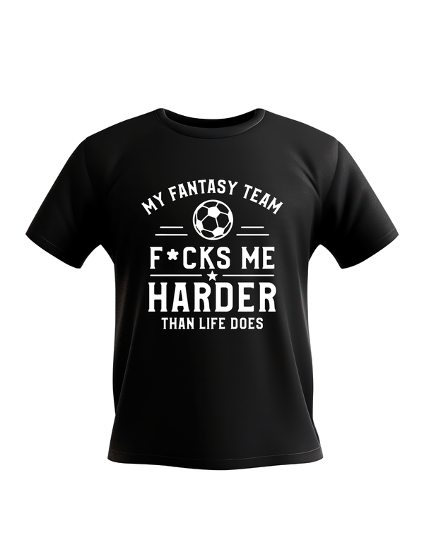 Black t-shirt with white text and a soccer ball graphic on a white background with a funny Cows Corner slogan on the front saying 'my fantasy team f*cks me hard than life does'