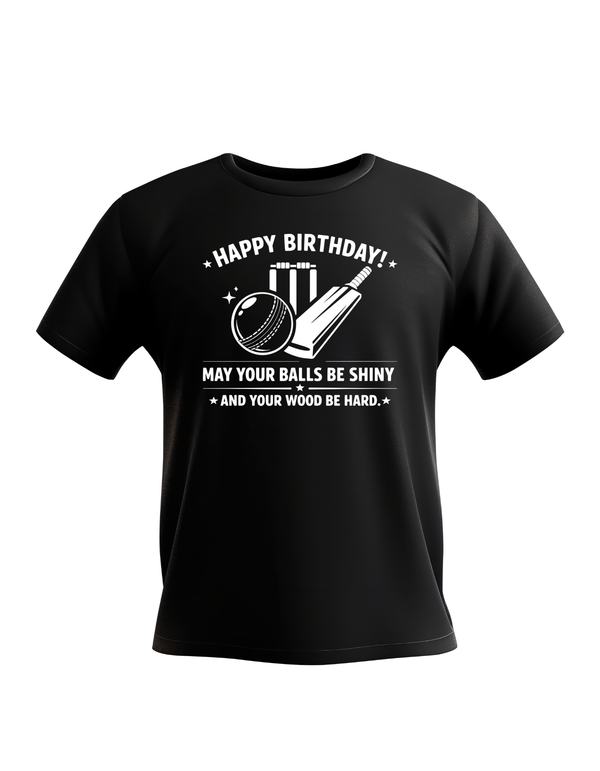 Black t-shirt with white text and graphics on a white background. This is a Cows corner t-shirt with the funny birthday cricket slogan 'Happy Birthday! May Your Balls Be Shiny and Your Wood Be Hard'.  Cows Corner gifts are perfect for sport-mad fans, these gifts work brilliantly for birthdays, new baby celebrations, Father’s Day, Mother’s Day, Christmas, anniversaries, thank you gifts, end-of-season team awards, graduations, retirements, and just-because moments when you want to raise a smile. 
