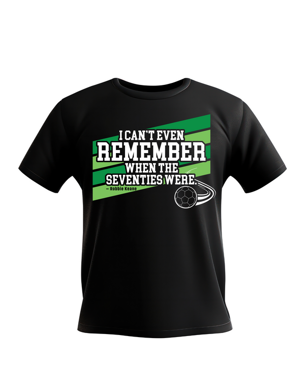 Black t-shirt with green and white text and graphic on a white background, with Cows Corner slogan I can't even remember when the seventies were - Robbie Keane