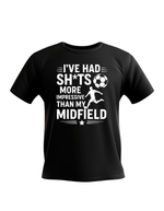 Black t-shirt with white text and graphic of a soccer player and ball on a white background, with the slogan saying 'I've had sh*ts more impressive than my midfield' a funny Cows Corner slogan