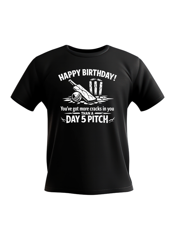 A Cows Corner t-shirt with the funny birthday cricket message on the front that reads 'Happy Birthday! You’ve got more cracks in you than a Day 5 pitch'. Cows Corner gifts are perfect for sport-mad fans, these gifts work brilliantly for birthdays, new baby celebrations, Father’s Day, Mother’s Day, Christmas, anniversaries, thank you gifts, end-of-season team awards, graduations, retirements, and just-because moments when you want to raise a smile. 
