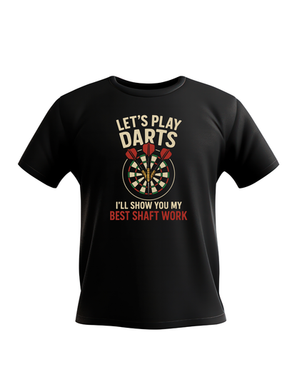 Black t-shirt with a dartboard graphic and text on a white background with a Cows Corner slogan saying Let's play Darts I'll show you my best shaft work