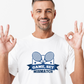 A man wearing a white t-shirt that has a funny tennis slogan on the front that reads 'Game, Set, Mismatch'