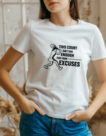 A lady wearing a white t-shirt with a funny tennis slogan on the front that reads 'This Court Ain't Big Enough For Your Excuses'