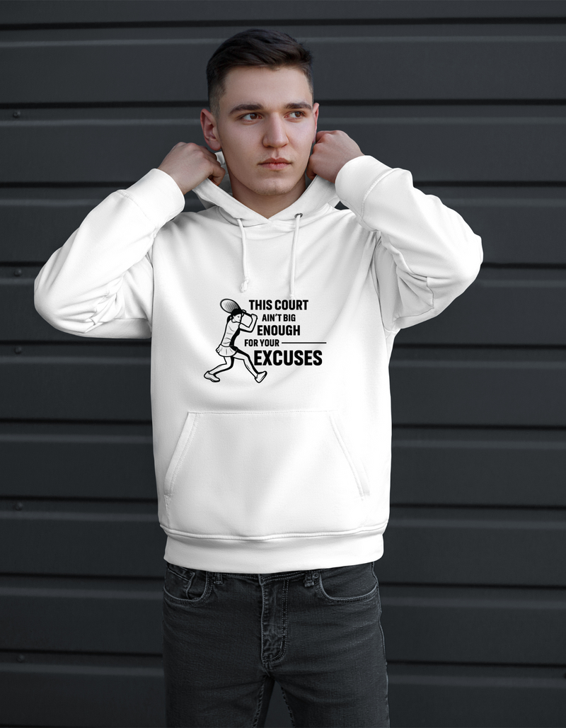 A man wearing a white hoodie with a funny tennis slogan on the front that reads 'This Court Ain't Big Enough For Your Excuses'