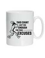 A white ceramic mug with the funny tennis slogan on the front that reads 'This Court Ain't Big Enough For Your Excuses'
