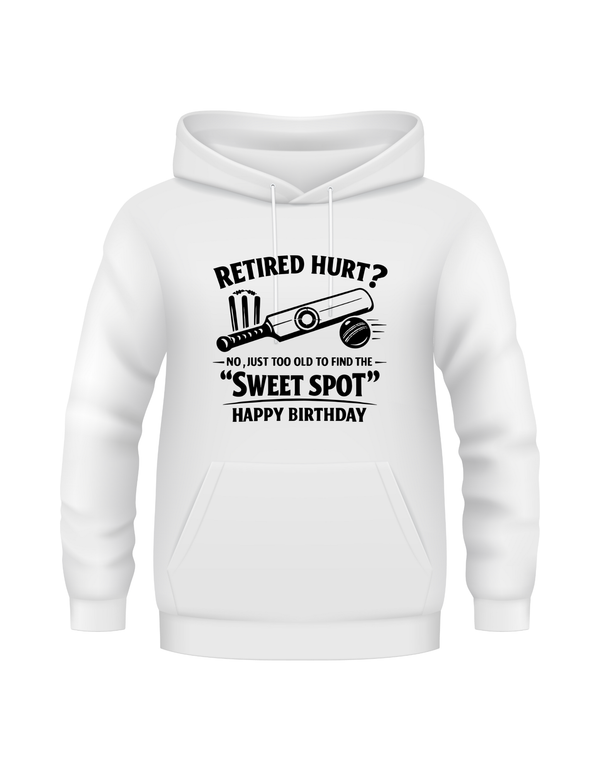 White hoodie with humorous text design on a white background. This is a Cows Corner hoodie with the funny cricket birthday slogan Retired Hurt? No, just too old to find the 'Sweet Spot' Happy Birthday. Cows Corner gifts are perfect for sport-mad fans, these gifts work brilliantly for birthdays, new baby celebrations, Father’s Day, Mother’s Day, Christmas, anniversaries, thank you gifts, end-of-season team awards, graduations, retirements, and just-because moments when you want to raise a smile. 
