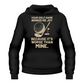 Black hoodie with golf-themed text and graphics on a white background with Cows Corner slogan saying, Your golf game brings me joy, because it's worse than mine