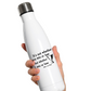 A white 500ml stainless steal water bottle with a funny tennis slogan on the front reading 'It’s Not Whether You Win or Lose but Whether I Win or Lose – Billie Jean-King! 