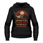A black hoodie with the funny golf saying on the front that reads 'Your Swing Is Like a Horror Movie, Ugly and Full of Screams'