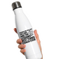 A white water bottle with the funny tennis coach saying on the front that reads 'Thanks for the Love the Lobs and the Lessons. Best Tennis Coach Ever'