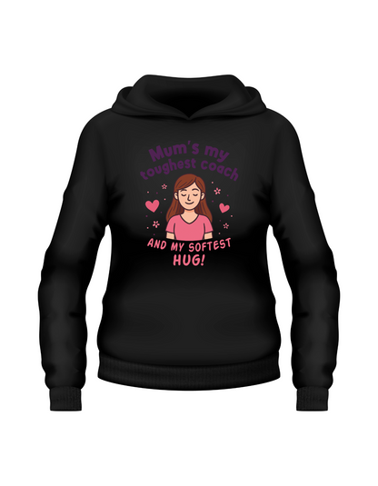 Black hoodie with a graphic and text on a white background.  Hoodie from Cows Corner with a slogan on the front saying 'Mum’s My Toughest Coach and My Softest Hug!