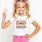 A little girl wearing a white t-shirt with Funny Kids Cricket T-shirt – "I'd Appeal To Dad, But He Never Changes His Decision on the front. A Funny Cricket T-shirt, Premium Fabric, Multiple Junior Sizes, Perfect for Boys and Girls