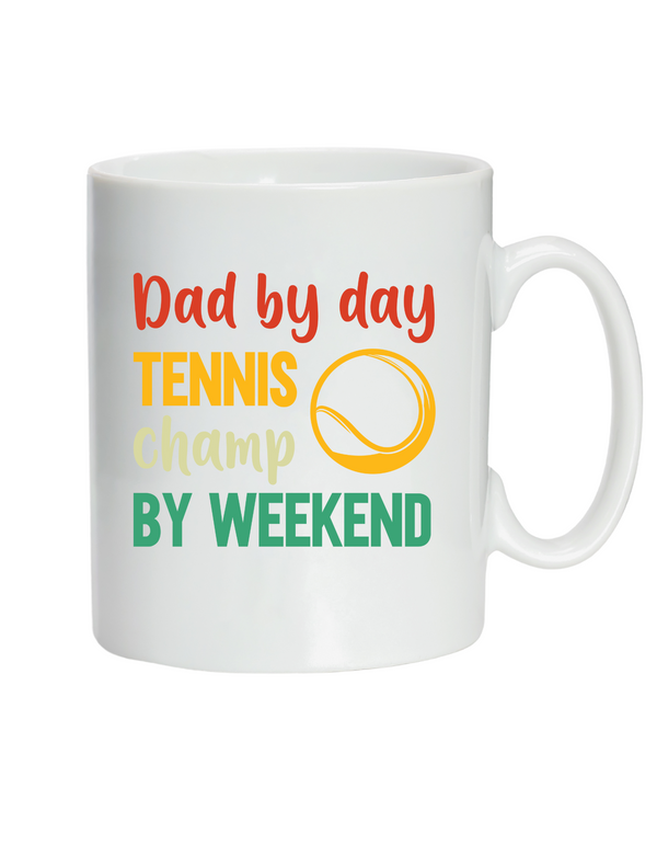 A white ceramic mug with a funny tennis slogan that reads 'Dad By Day, Tennis Champ By Weekend'