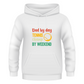 A white hoodie with the funny tennis slogan on the front that reads 'Dad By Day, Tennis Champ By Weekend'